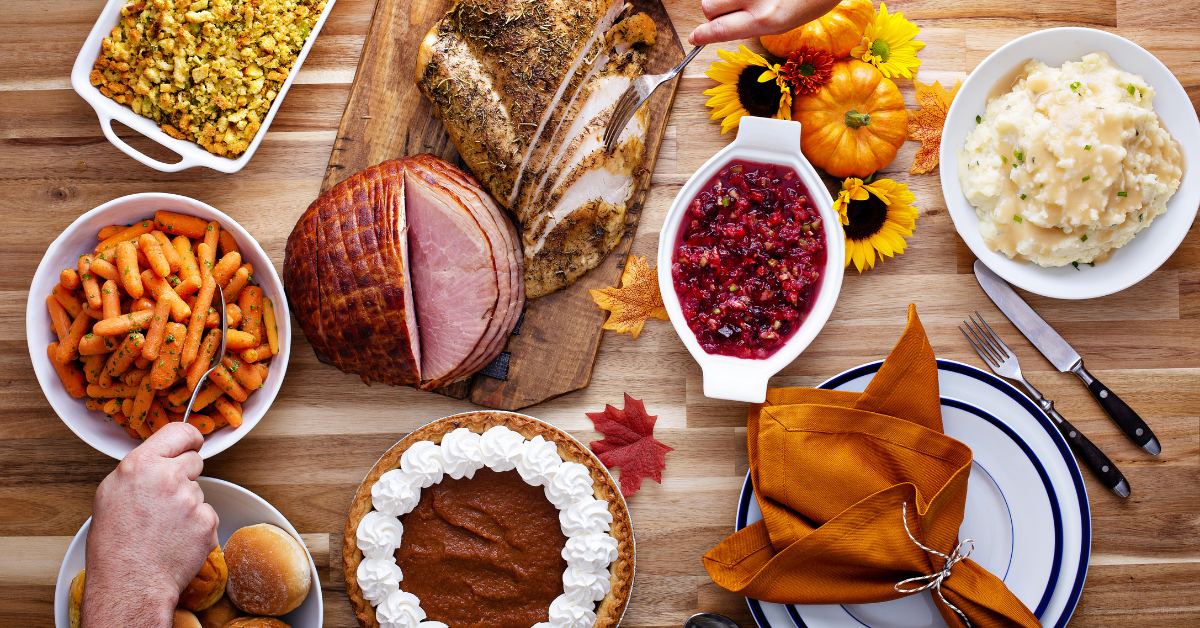 family thankful for the food on their thanksgiving table